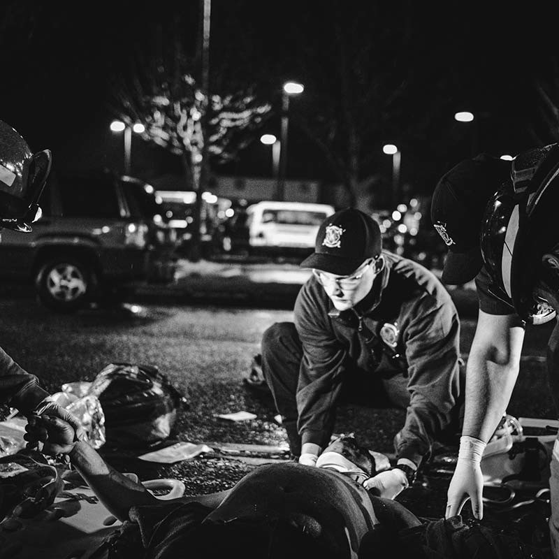 Medics helping person struck by vehicle