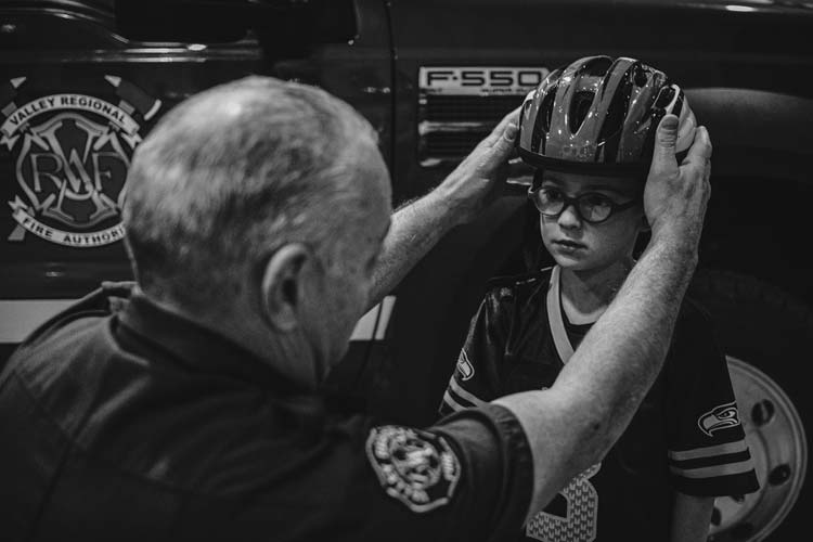 Helmet fitting on child