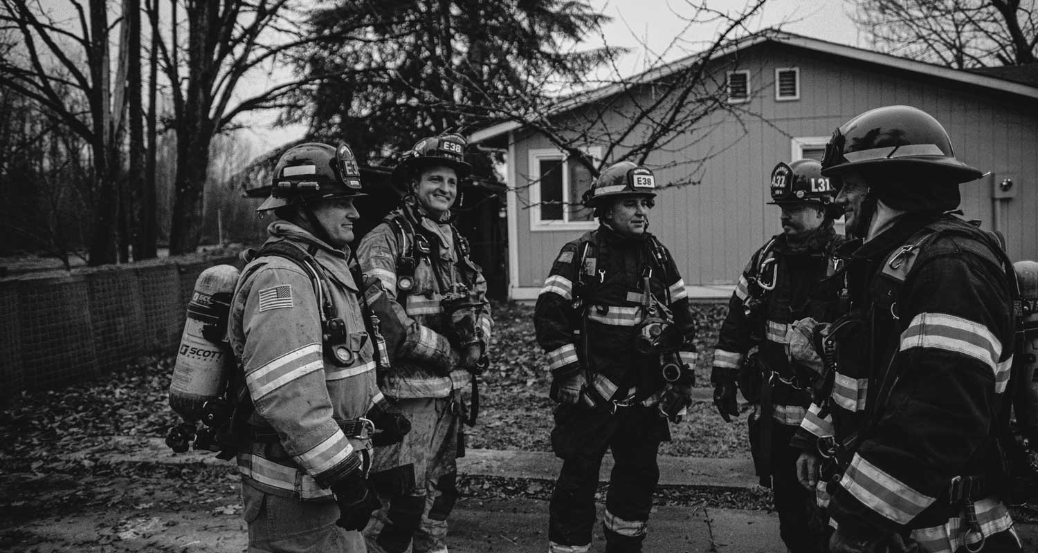 Huddled up at putting out fire