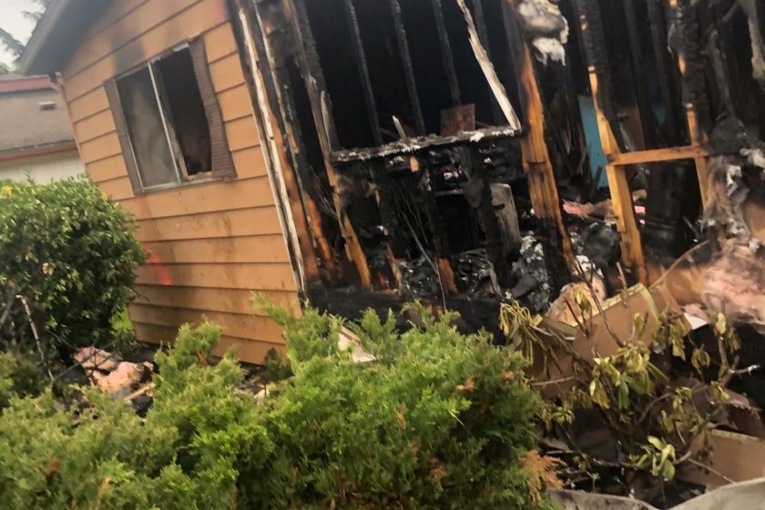 A house that has been rescued by firefighters after a fire.