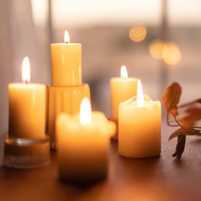 Five beautiful lit candles