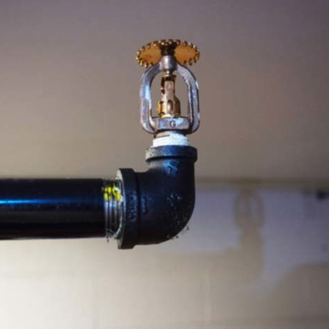 Fire sprinkler at the end of a pipe