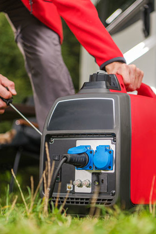 Man pulling on a gas generator