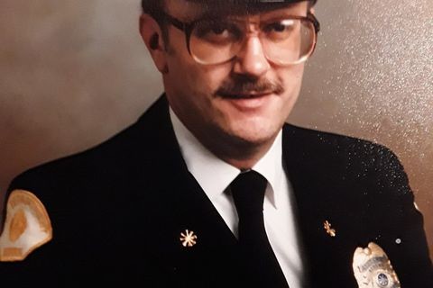 A photo of a firefighter from Valley Regional Fire Authority in uniform providing service and rescue.