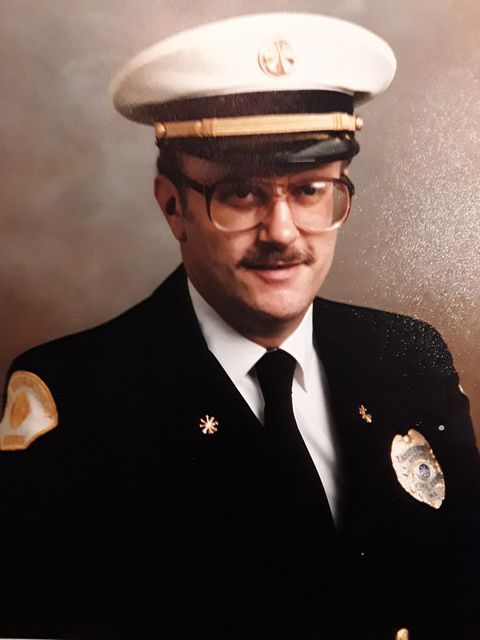 A photo of a firefighter from Valley Regional Fire Authority in uniform providing service and rescue.