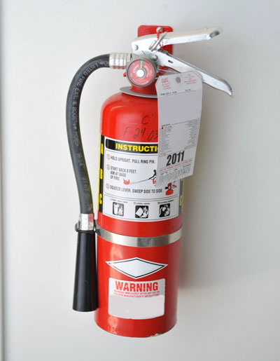 Handing fire extinguisher