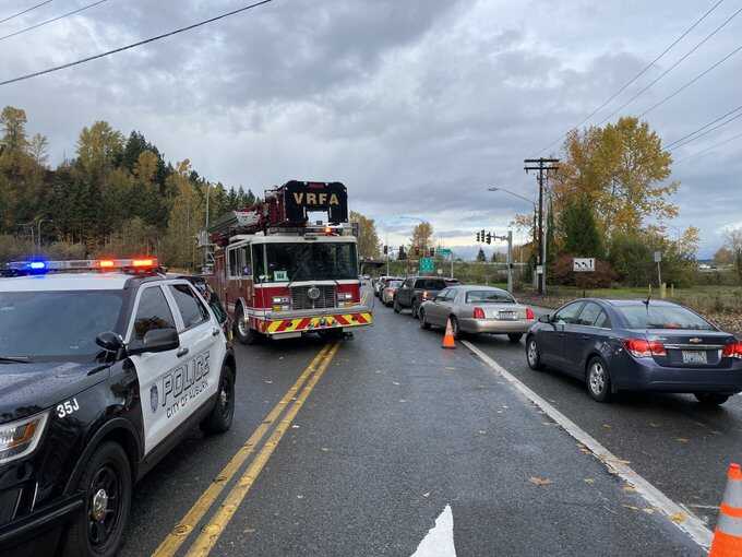 car crash response with fire truck strung across street