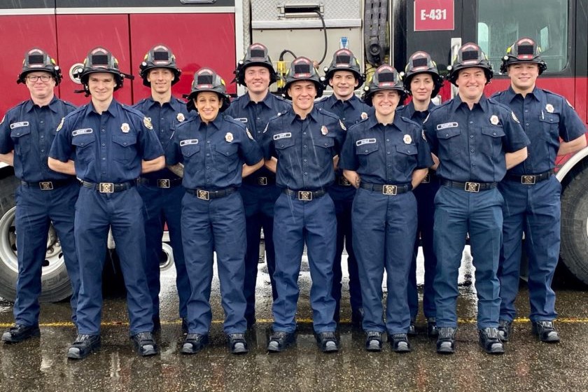 A group of Valley Regional Fire Authority firefighters posing in front of a fire truck.