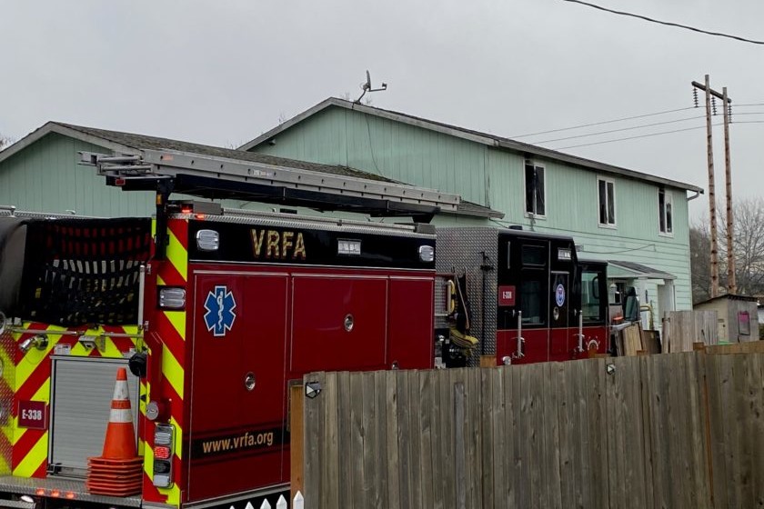 Two Valley Regional Fire Authority fire trucks parked in front of a house.