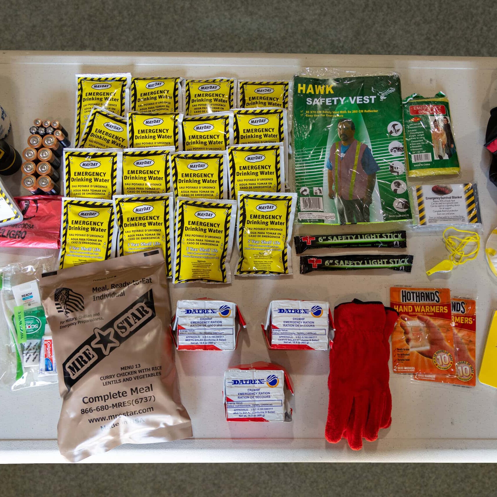 Emergency kit items laid out on a table